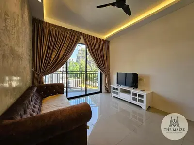 a living room with a couch and a tv at The Cove Hillside Residence Ipoh - Nostalgic Terracotta in Ipoh
