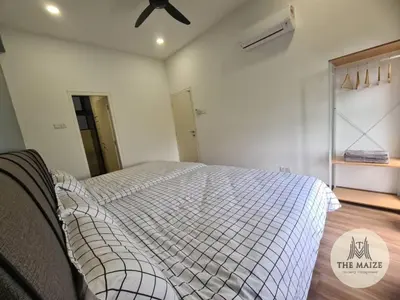 a bedroom with a bed and a ceiling fan at The Cove Hillside Residence Ipoh - Elegance Parisian in Ipoh