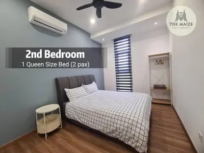 a bedroom with a bed and a ceiling fan at The Cove Hillside Residence Ipoh - Elegance Parisian in Ipoh