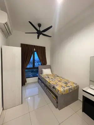 a bedroom with a bed and a ceiling fan at The Horizon Ipoh 3BR ORCHID - by Goswell in Ipoh