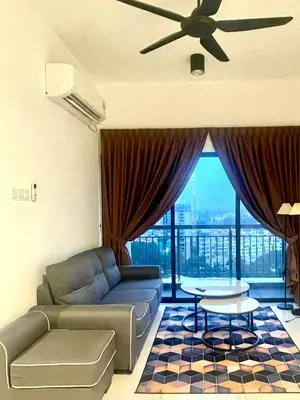 a living room with a couch and a ceiling fan at The Horizon Ipoh 3BR ORCHID - by Goswell in Ipoh