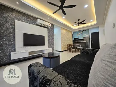 a living room with a couch and a tv at The Cove Ipoh - Blissful Abodes in Tambun