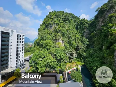 a mountain view from the balcony of a hotel at The Cove Ipoh - Blissful Abodes in Tambun