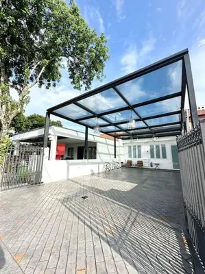 a patio with a canopy on top of a building at Stylish Cozy Landed Jelutong 3BR 2B 4CP-10pax by 3C in Jelutong