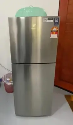 a stainless steel refrigerator in a kitchen at Renovate on progress in Kuala Kubu Baharu