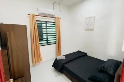 a small bedroom with a bed and a window at Rumah Kita HStay BM view Self check in 2Room in Kubang Semang
