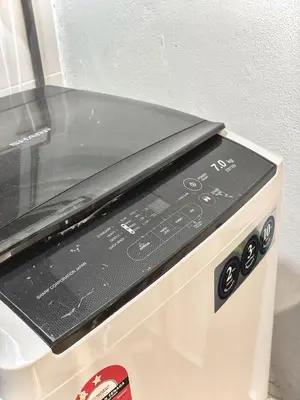 a close up of a toaster oven with a microwave at Kampung Paloh Residence Ipoh with 2 Parking & Free Netflix in Ipoh