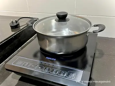 a pot sitting on top of a stove at Kampung Paloh Residence Ipoh with 2 Parking & Free Netflix in Ipoh