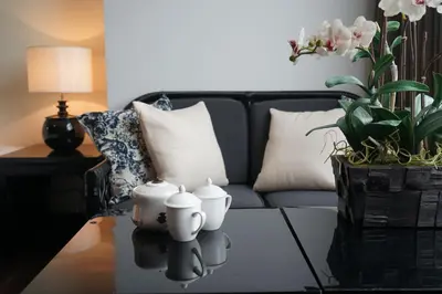 a living room with a couch and a coffee table at Hotel 19, Penang in George Town