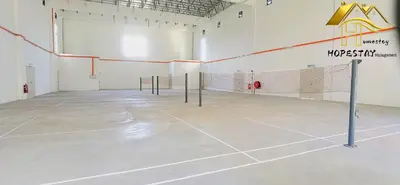 a tennis court with a net in a room at Ipoh Anderson Suite 1802 By Hopestay in Ipoh