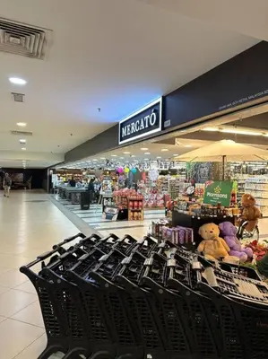 a store with a shopping mall withroups of stuffed animals at Netflix Studio Seaview 118Island Plaza in Tanjong Tokong