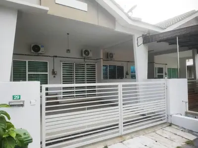 a white fence in front of a house at Setia Homestay Chemor Setia in Chemor