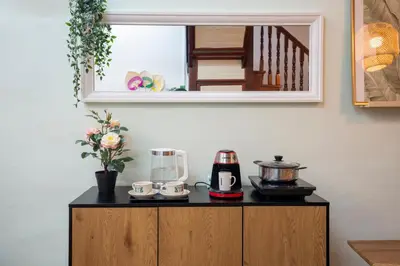 a counter with a blender and cups on it at The Bibik at 8 Clarke -NEW Entire #Unesco #HeritageHome in George Town