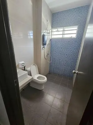 a bathroom with a white toilet and a sink at Mysa at Meru Ipoh in Ipoh