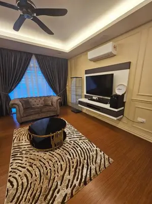 a living room with a television and a zebra rug at Mysa at Meru Ipoh in Ipoh