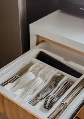 a plastic drawer with utensils in a refrigerator at Ipoh Tiga Pool Villa by Papahost in Ipoh