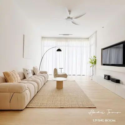 a living room with a couch and a tv at Beacon Georgetown Skypool Cityview Free 2 Carpark in George Town
