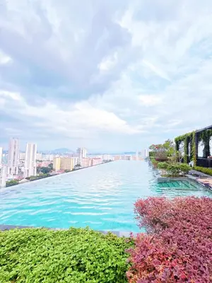 a large body of water with buildings in the background at Beacon Georgetown Skypool Cityview Free 2 Carpark in George Town