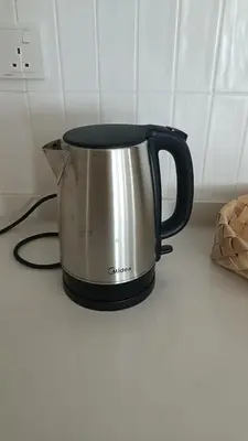 a coffee pot sitting on top of a counter at Serenity Haven in Sungai Besar