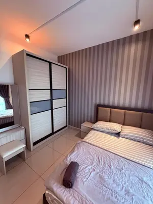 a bedroom with a large bed and a large window at The Majestic Ipoh 3BR - Goswell in Ipoh
