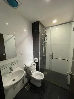 a bathroom with a toilet and a sink and a shower at The Majestic Ipoh 3BR - Goswell in Ipoh