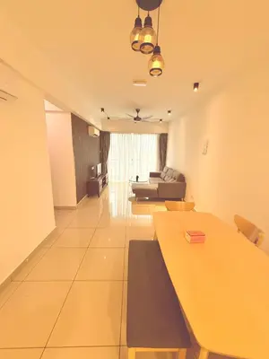 a living room with a table and a couch at The Majestic Ipoh 3BR - Goswell in Ipoh