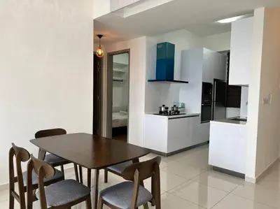 a kitchen and dining room with a table and chairs at Greatview 2BR Infinity Pool & EasyAccess to Town 13 in George Town
