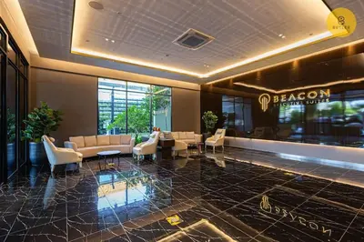 a lobby of a hotel with couches and chairs at Seaview 2BR Infinity Pool & EasyAccess to Town 191 in George Town
