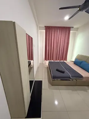 a bedroom with a bed and a red curtain at Casa Kayangan Meru Ipoh 3BR DAISY -by Goswell in Ipoh