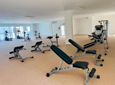 a gym with several exercise bikes in a room at The Anderson Condo with NETFLIX with Free Parking with Swimming Pool and at Ipoh City Centre Nearby to all amenities and attractions in Ipoh