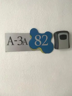 a sign that says a on a wall at DyMaz Salam Homestay in Seri Iskandar