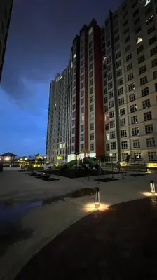a large building with lights in front of it at Ipoh Anderson Cozy downtown in Ipoh