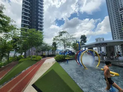 a water park in a city with a water slide at Urban Suites - Queens Suite in Jelutong