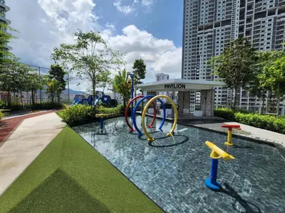 a water park with a playground with a water slide at Urban Suites - Queens Suite in Jelutong