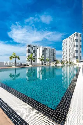 a swimming pool in a city with tall buildings at Platinum Suite Meritus by Moowin in Perai