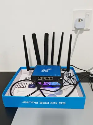 a laptop computer sitting on top of a box at Comfortable Greenery in Seri Iskandar