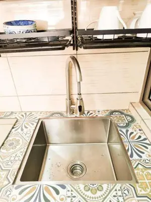 a stainless steel sink in a tiny kitchen at Mossy Forest Family Retreat III, 2-8pax, Sunrise View, Cameron Highlands in Cameron Highlands