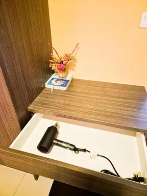 a bathroom with a sink and a vase of flowers at Mossy Forest Family Retreat III, 2-8pax, Sunrise View, Cameron Highlands in Cameron Highlands