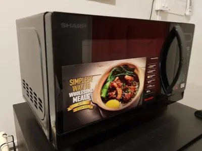 a microwave with a picture of a bowl of food in it at Heritage Studio in UNESCO Zone near to StreetArt & Town 2 in George Town