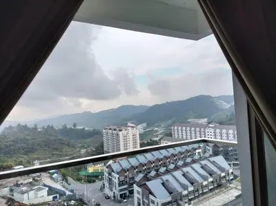 a view from a window of a city with buildings at Ammara Homestay 3 Palas horizon Kea Farm in Cameron Highlands