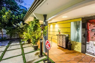 a house with a no parking sign in front of it at Surprised Homestay by uBook in Butterworth