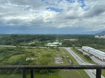 an aerial view of a park with buildings and a road at KF Homestay Double Suite in Kampar