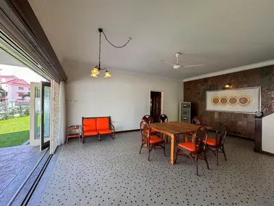 a dining room with a table and chairs at PRIME Location - 5 Mins Walk to Shops & Eateries! in Tanjung Bungah
