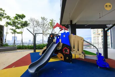 a playground in a building with a slide at Spacious 3BR in Tropicana 218 at Central Location & Food Hunt Friendly in George Town
