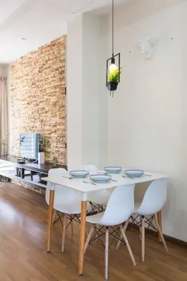 a white dining room with a white table and chairs at Landed 3BR Home Near Beach, Seafood & Fisherman Village in Bayan Lepas