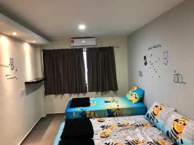 a room with a bedroom with a bed and a window at Ipoh Budget in Ipoh