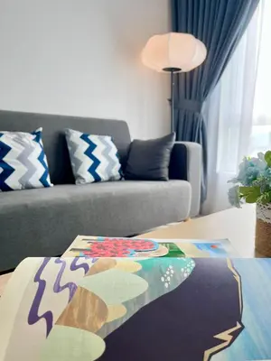 a living room with a couch and a table at Anderson Ipoh by Iconique Espace in Ipoh