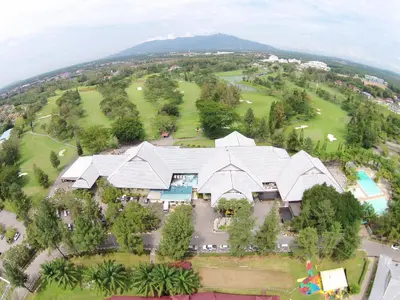 an aerial view of a house with a large building at Cinta Sayang Resort in Sungai Petani