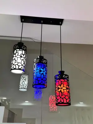 a group of lights hanging from the ceiling at \u5bb6\u5bb6\u6c11\u5bbf in Nibung Tebal