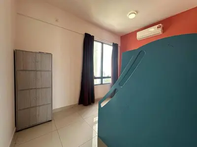 an empty room with a closet and a window at SweeT Homestay in Perai